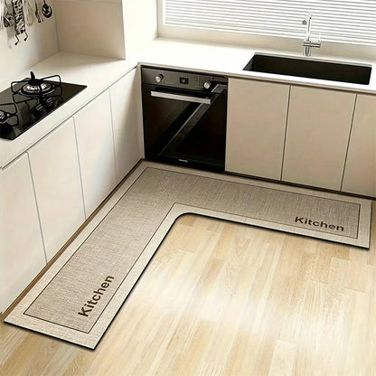 💧 Stop slipping on wet kitchen floors — this L-shaped mat absorbs water and oil fast, stays put, and cushions your feet while you cook. 🏠
