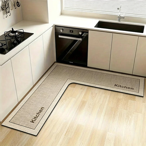 💧 Stop slipping on wet kitchen floors — this L-shaped mat absorbs water and oil fast, stays put, and cushions your feet while you cook. 🏠
